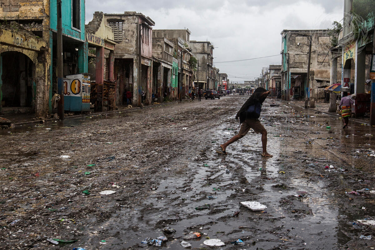 Aftermath of a hurricane illustrating the human cost of weak climate accountability